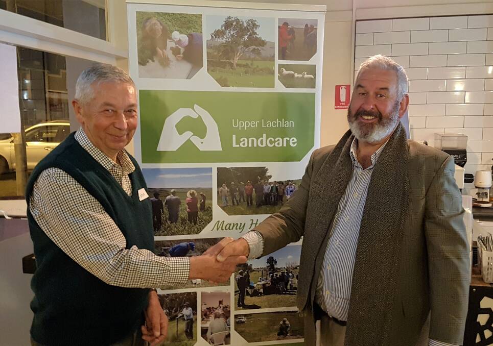 John Weatherstone and chair of Upper Lachlan Landcare Vince Heffernan celebrate 25-years of the Landcare movement. Photo courtesy Ruth Aveyard