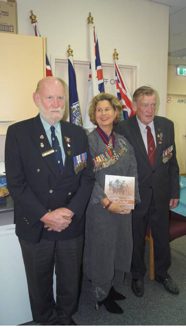 Dust to Mud: Crookwell RSL Sub Branch secretary Bev Hatch, and president Kevin King flank Pam Kensit at the second edition book launch.