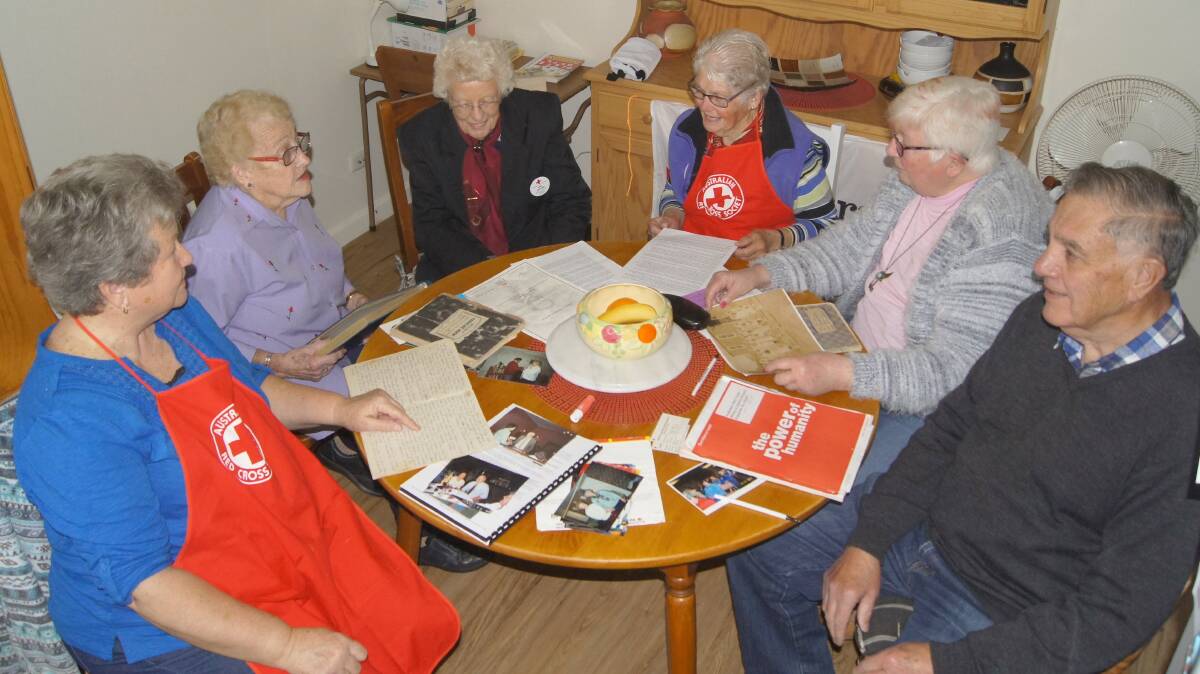 The good old days: Red Cross members share their stories (L-R) Ann Turner, Beryl Collins, Iris Waters, Pam Kelly and Sally and Ian Hutchings. Photo: Clare McCabe