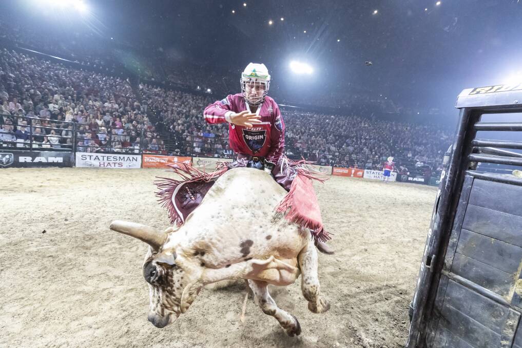 Rodeo: Kurt Shephard riding High Class Hooker in round 1.35 at PBR Origin, which was held at ICC Sydney Theatre at Darling Harbour on June 1. Photo courtesy PBR