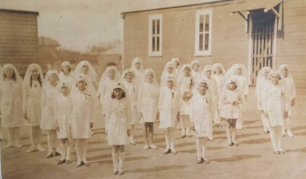 Young Red Cross ladies at Crookwell Public School photographed in the early 40's.