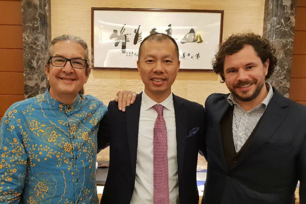 It's high time for tea: The Tea House and Gallery's Stephen Carrol, with Mr Yang, and Owen Terry. Photo supplied.