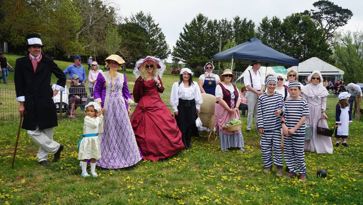 John Macarthur, an early Taralga settler (left) and a posse of convicts, children, and women dress up in early 19th Century garb. Photo: Clare McCabe