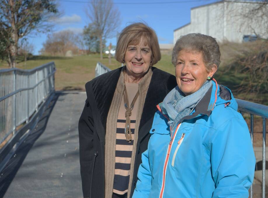 History: Trevene Mattox and Elaine Delaney say the footbridge over Kiamma Creek should be named after Dame Mary Gilmore. Photo: Clare McCabe.