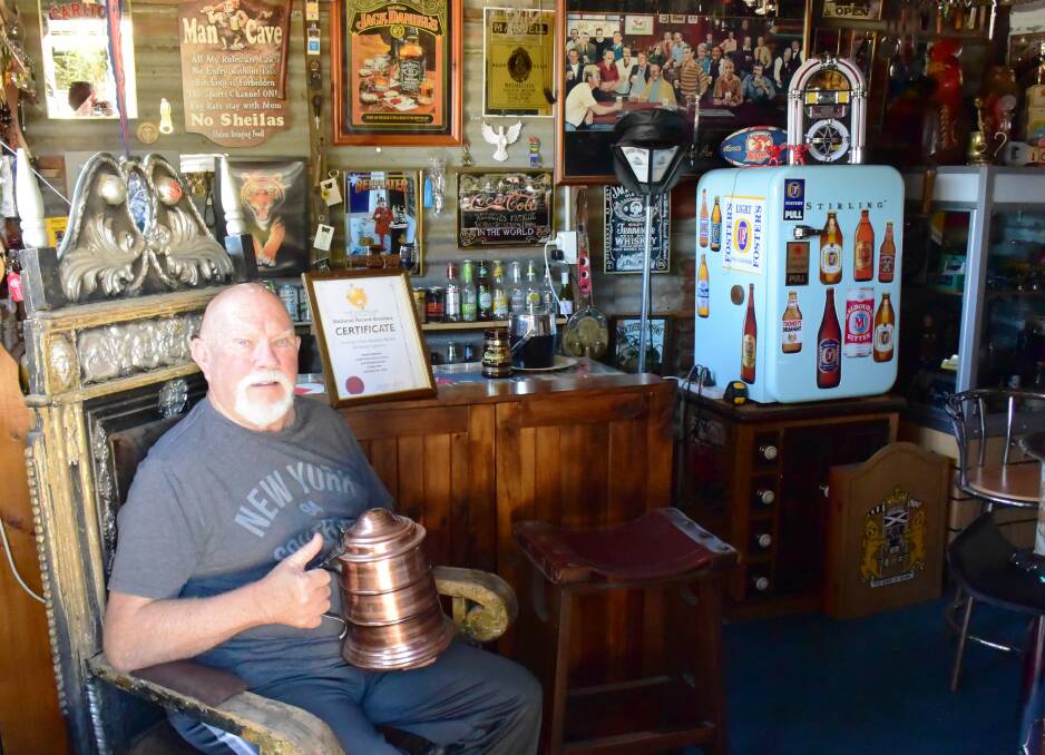Record setter: Dennis Harrison has the biggest collection of bottle openers in Australia. Photo: Clare McCabe