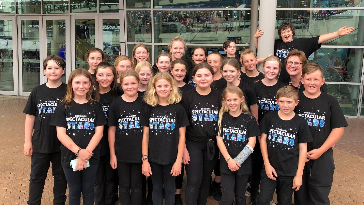 Education: Crookwell Primary School students and Margaret Hayes at the Qudos Bank Arena for Schools Spectacular. Photo supplied