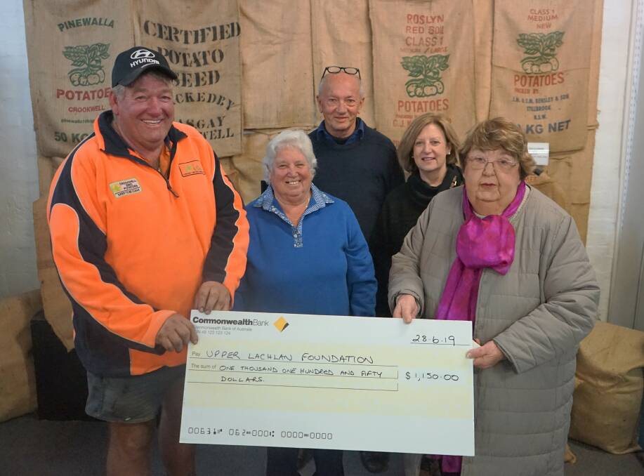 Generous donation: Garry Kadwell accepts a cheque from Jan Pont, Marcus Kollakides, Darian Cameron and Joyce Edwards. Photo Clare McCabe
