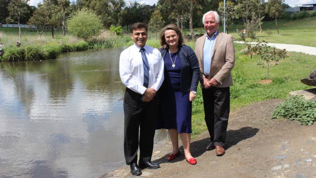 Government: Upper Lachlan Shire Council director of infrastructure Mursaleen Shah, with Member for Goulburn Wendy Tuckerman, and mayor John Stafford at Kiamma Creek, Crookwell. Photo supplied.