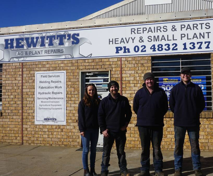 Josh says: "It is great to now be living back in my home town running Hewitt's Ag & Plant Repairs with wife Casey, and fellow locals Adam Kennedy [third from left] and Blake Haynes [far right]". Photo: Supplied.