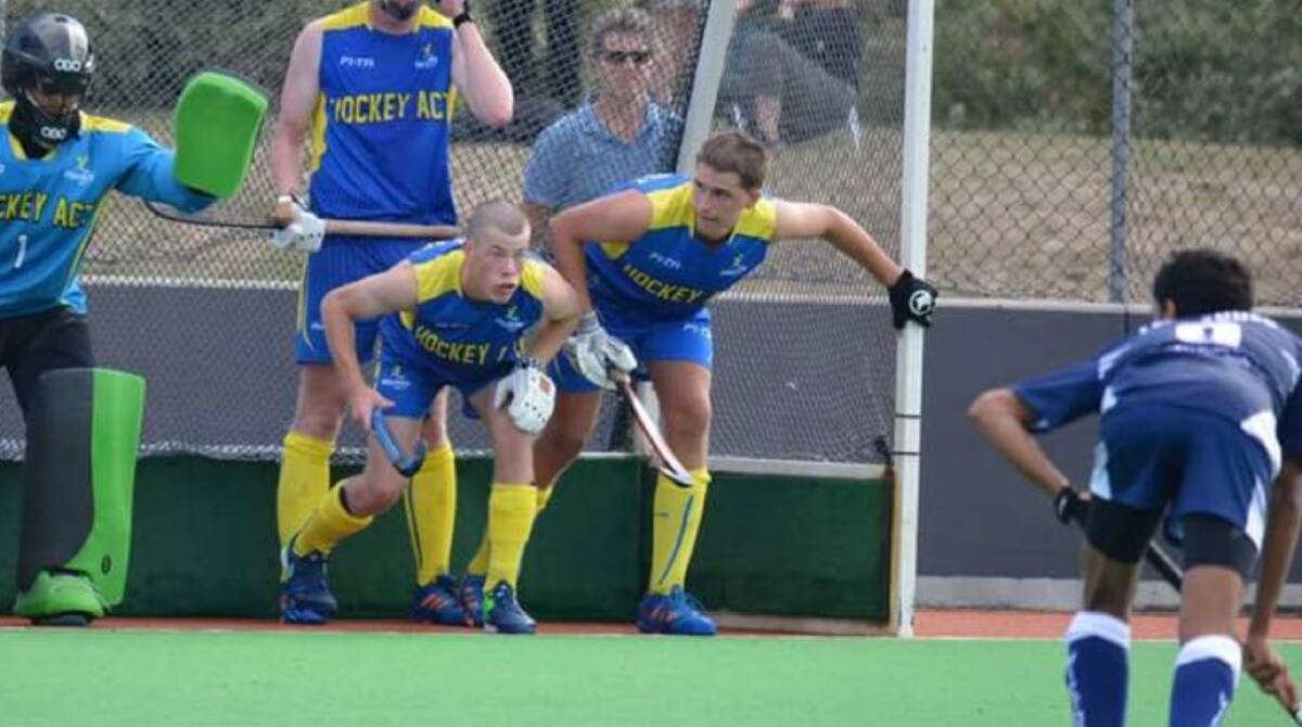 Focused: Zac McGregor (right) has represented the ACT numerous times in recent years, and stood out during the 2020 National Indoor Hockey Festival. Photo: Facebook. 