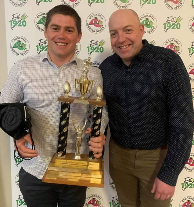 Winner: Ben Picker (left) received the George Tooke Best and Fairest award from Green Devils men's coach, Simon Smith. Photo: Crookwell Senior Green Devils/Facebook.