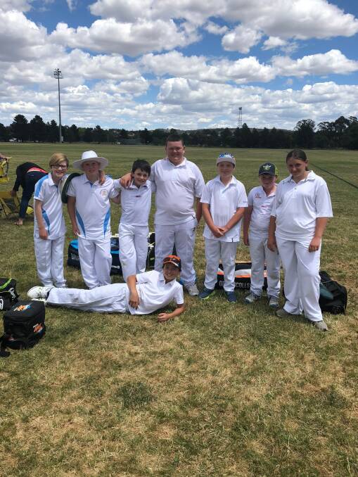 The team: Crookwell are all smiles and star of the day Cameron Morton (third from right) was the key to their huge total. Photo: Supplied.