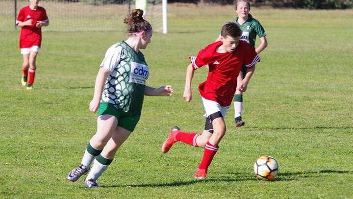 On the run: The Crookwell Soccer Club put forward some strong performances across all grades on the weekend. Photo: Supplied.