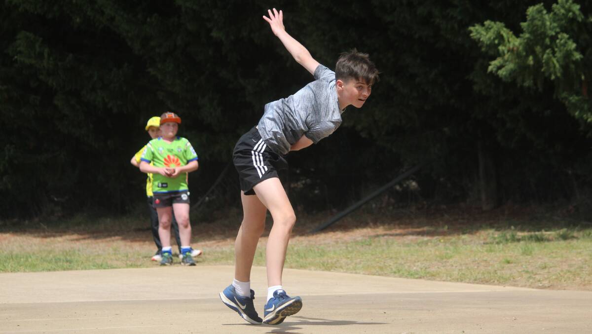 Warm up: The junior Crookwell bowlers warmed up well in advance of Thomson's arrival and were very keen to strut their stuff. Photo: Zac Lowe.