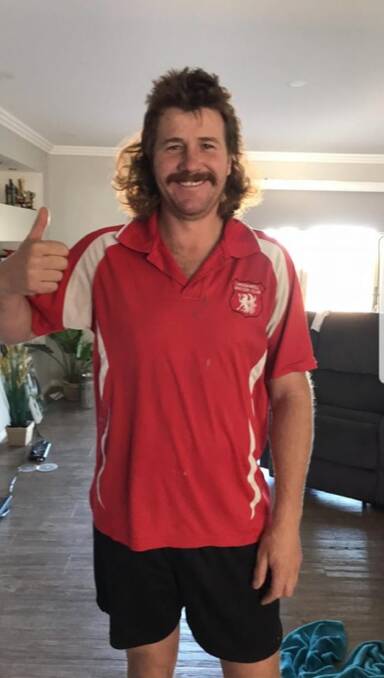 Thumbs up: Kent McDonald has left the fate of his glorious mullet in the hands of the community, who will decide whether or not to lop off his locks by the night of August 10. Photo: STFA/Facebook.