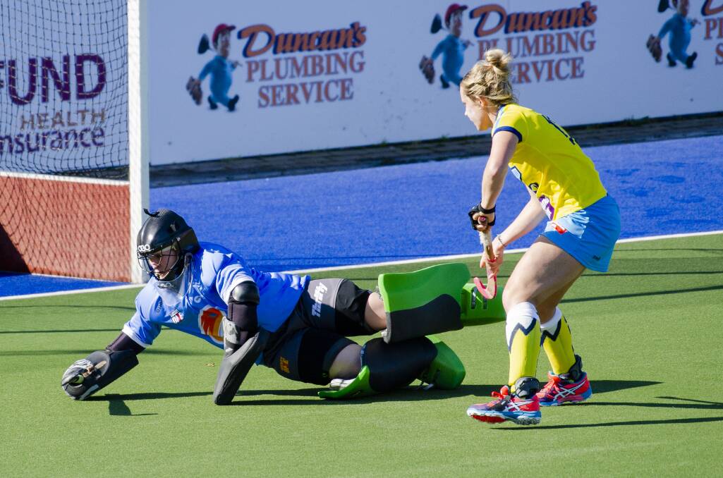 Great save: The semi-final between Canberra and Melbourne was decided in a shootout. Photo: Jamila Toderas.