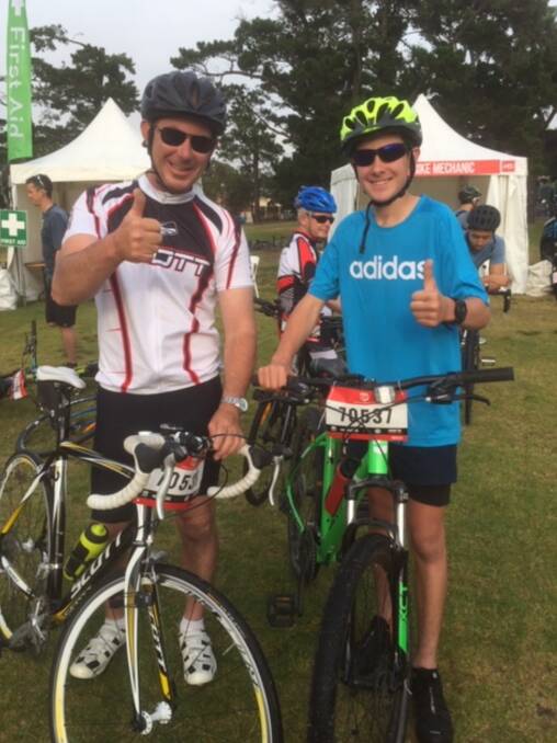 The Gambles: Scott Gamble (left) with his son, Rohan, at the MS Sydney to Wollongong Charity Bike Ride recently. Photo: Supplied.