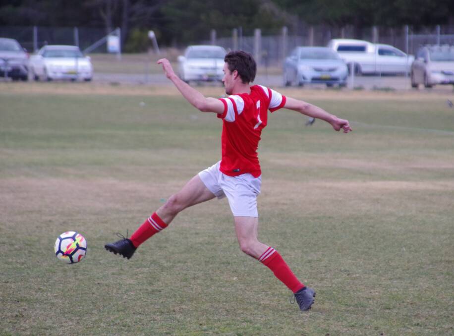 Stretch: Both Crookwell sides fought for a hard-earned draw in last weekend's Division One soccer fixtures, which saw the Reds trump the Griffins on the ladder by goal differential. Photo: Darryl Fernance. 