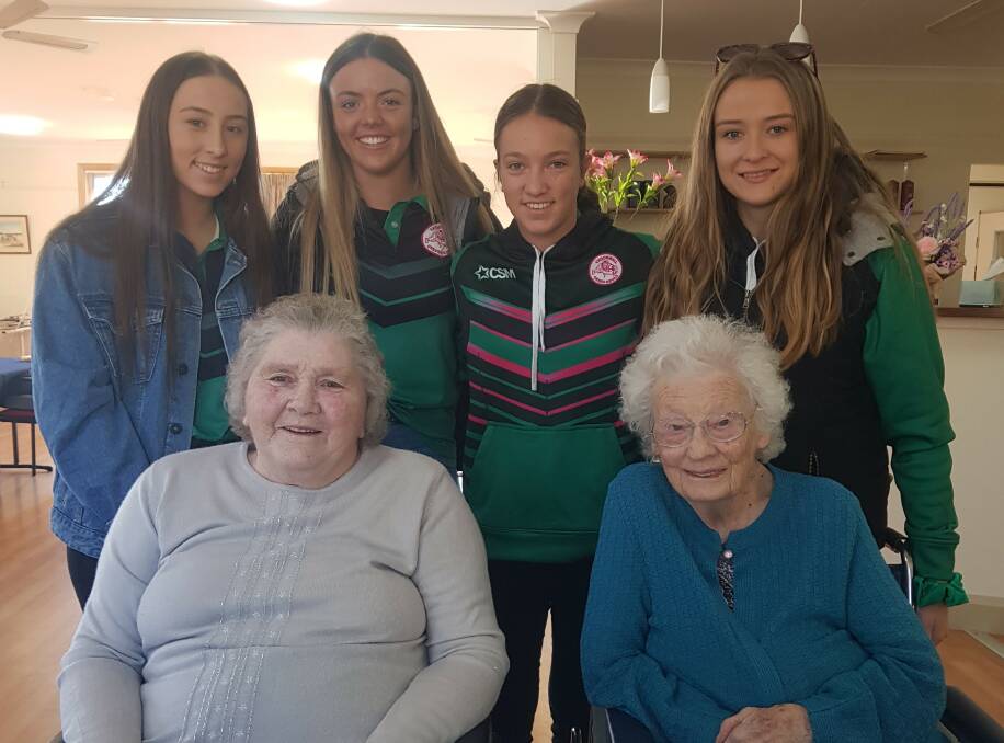 Welcome visit: The Crookwell She Devils are warmly received by residents during a recent visit to Viewhaven Lodge and Sunset Lodge. Photo: Supplied.