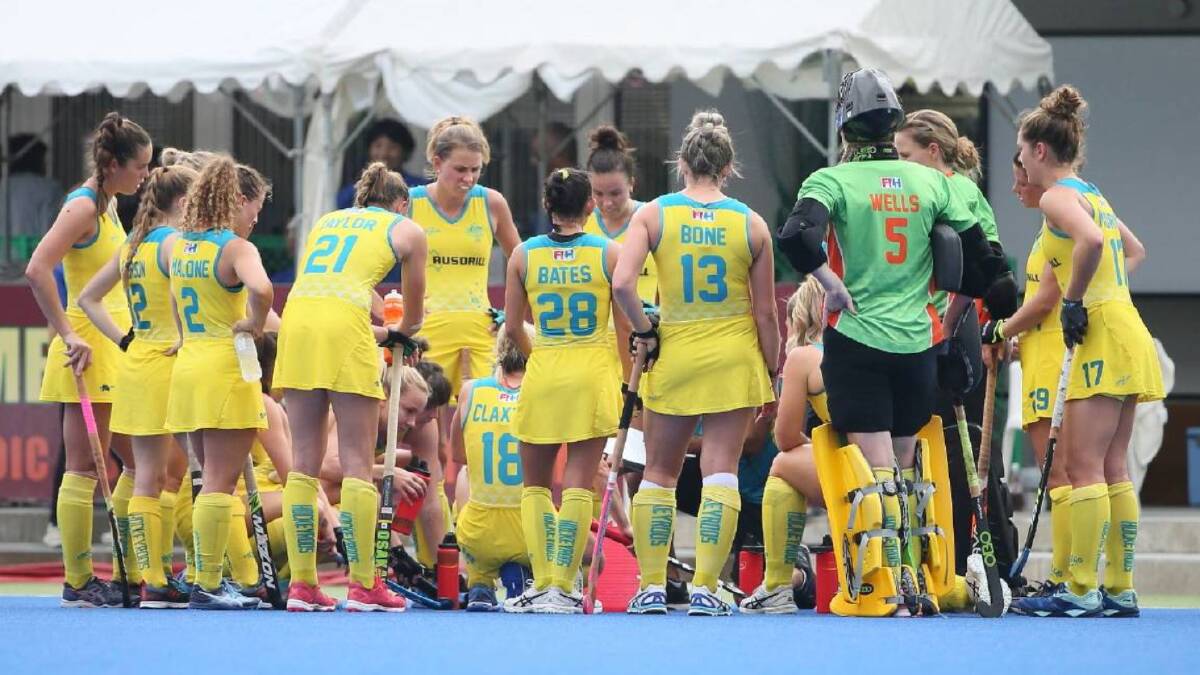Huddle: The Hockeyroos have a serious discussion during their Four Nations loss to Japan. Photo: Hockey Australia. 