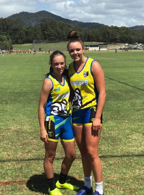 The girls: Annika Picker (left) and Jayde Della proudly wear their ACT gear on the first day of the Oztag National Championships in Coffs Harbour over the weekend. Photo: Crookwell Green Devils. 