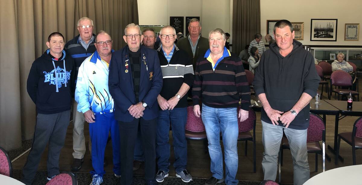 Proud: Austin McGaw (centre) is now a life member. Photo: Supplied.