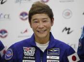 Japanese billionaire Yusaku Maezawa's moon flyby private space mission has been cancelled. (AP PHOTO)