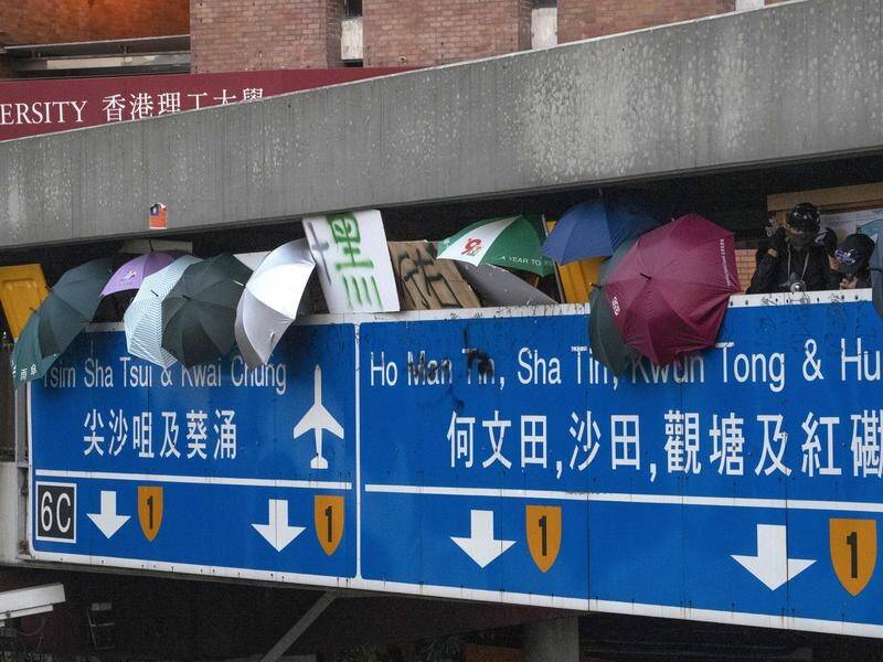 Hong Kong protesters continue blockading major roads, including the Cross-Harbour Tunnel.