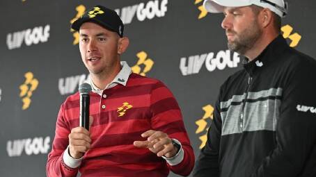 Lucas Herbert (left), with Ripper GC teammate Marc Leishman, says he's thrilled to be with LIV Golf. (Michael Errey/AAP PHOTOS)