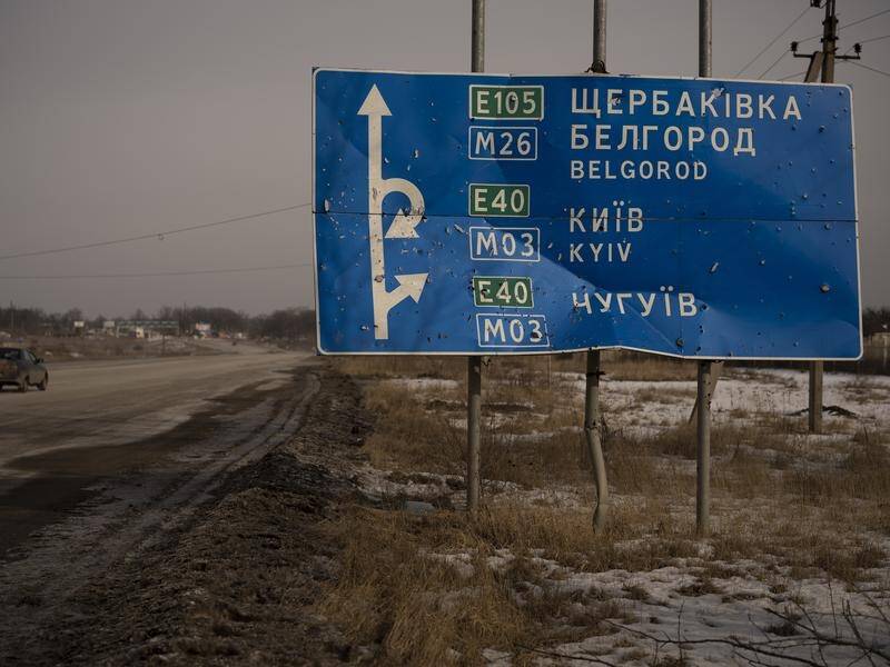 Ukraine has fired artillery shells and cluster munitions at a Russian village, an official says. (AP PHOTO)