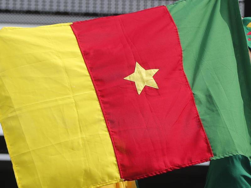 Twelve people have been killed after a four-storey building collapsed in Cameroon. (EPA)