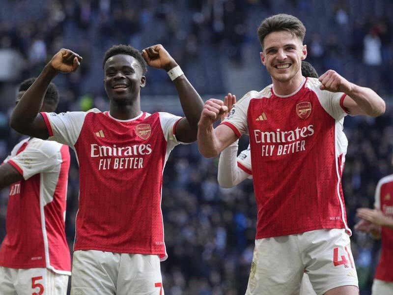 Arsenal's charge to a first EPL title since 2003/04 is on track thanks to a win at rivals Tottenham. (AP PHOTO)