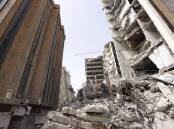 The collapse of a 10-storey building in Abadan has left 24 people dead, Iranian officials say.