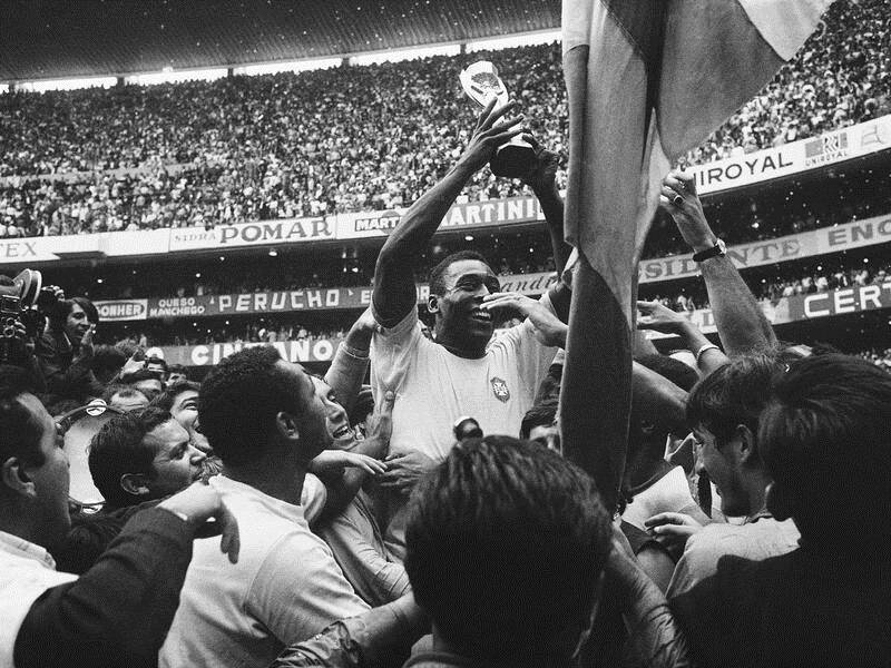 The great Pele, here holding aloft the World Cup in his 1970 pomp, is having a quiet 80th birthday.