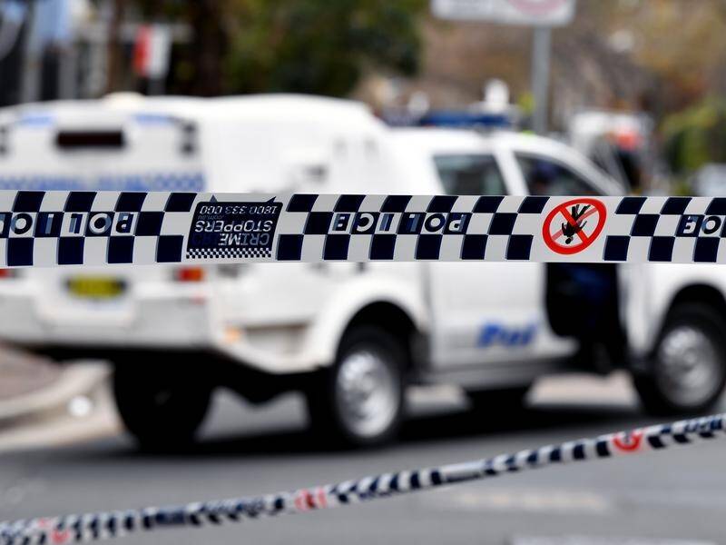 A man has been shot in the leg by Sydney police after allegedly attacking an officer with a knife.