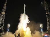 North Korea says it successfully launched its first military spy satellite on November 21. (AP PHOTO)