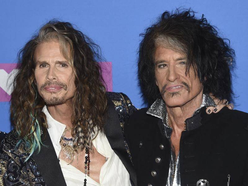 Aerosmith's Joe Perry, right, with Steven Tyler, collapsed following a performance on Saturday.