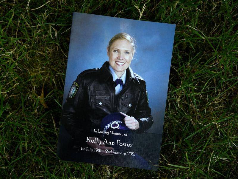 A funeral has been held for NSW police officer Kelly Foster, who drowned trying to save a canyoner.