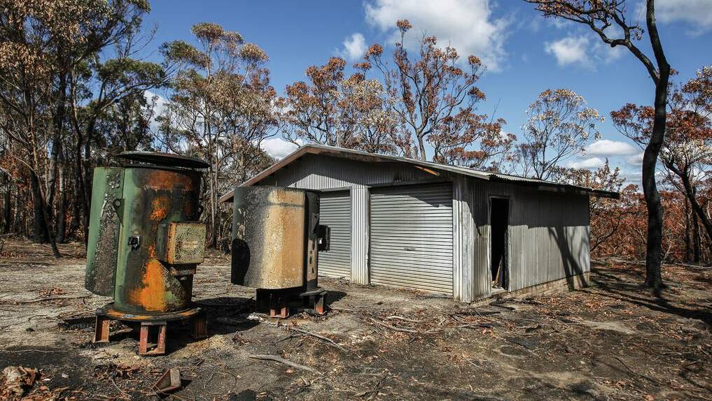 A shed with burned tanks near the filtration plant. Photo: CHRISTOPHER CHAN