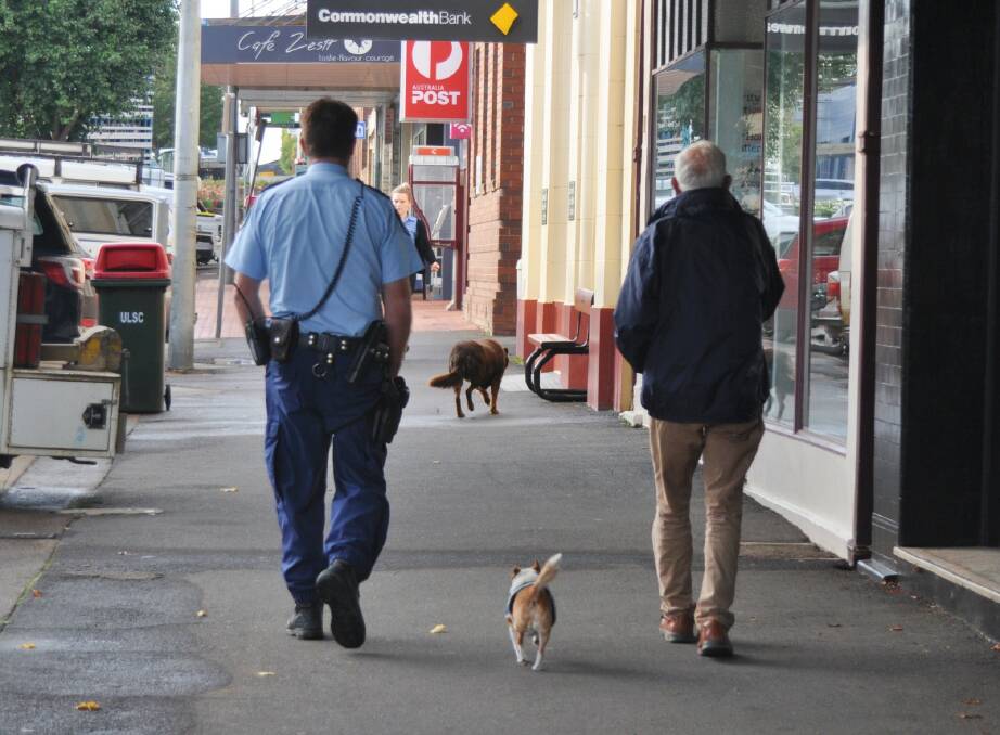 Police are present on the main street of Crookwell advising people of the government's restrictions. Photo: Hannah Sparks