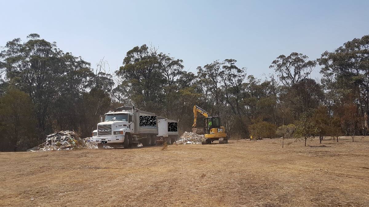 A Western Sydney-based waste disposal company is ordered to clear waste it dumped on Towrang Road, Big Hill. Photo: supplied by Upper Lachlan Shire Council