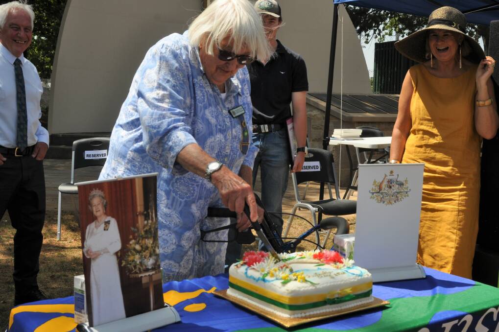LIVING LEGEND: 2020 Crookwell Citizen of the Year Dorothy Brennan cuts the cake on Australia Day. Photo: Hannah Sparks