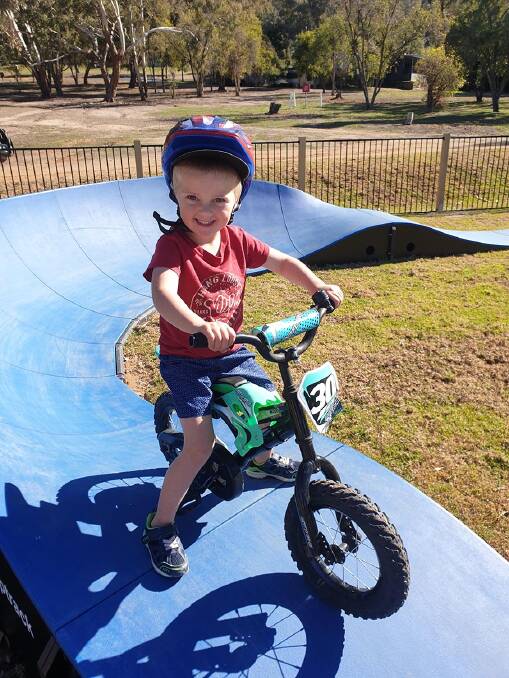 NEW ACTIVITIES ATTRACT VISITORS: Kayden Barrett, aged 4, rides his bike on the new pump track at Wyangala Waters. Photo: supplied