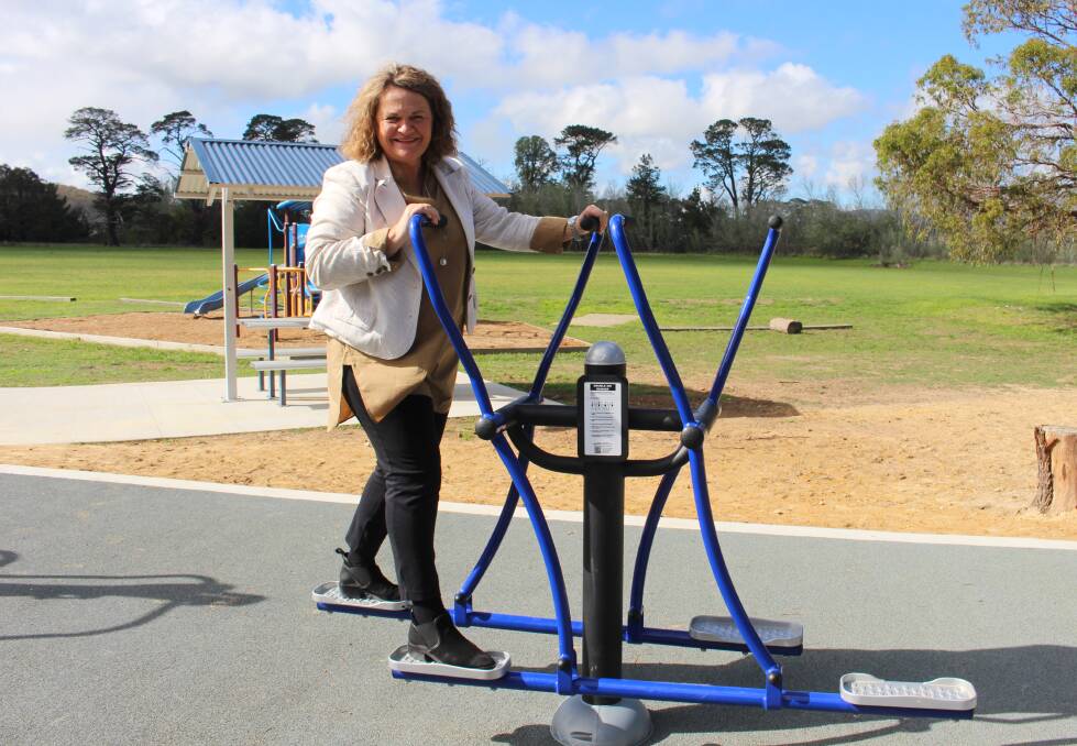 State member for Goulburn Wendy Tuckerman on the new fitness equipment in Collector. Photo: Chris Gordon